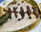 Foto del paso 12 de la receta Dorada en salsa de puerros, anchoas y alcaparras