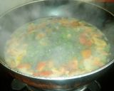 A picture of step 1 of Beans Tomato Egg drop soup.