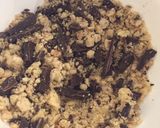 A picture of step 4 of Pear, Hazelnut & Bournville Dark Chocolate Crumble 🍐🍫.