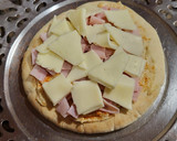 Foto del paso 4 de la receta: Pizzeta de pan de pita con hummus