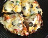 A picture of step 5 of Leftover Roti Tawa Pizza 🍕.