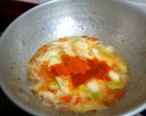 A picture of step 4 of Sweet raw mango pickle.