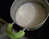 A picture of step 1 of #theme challengeRice and split green grams with egg.