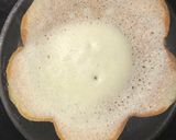 A picture of step 5 of Appam with coconut milk.