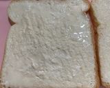 A picture of step 3 of Apple pie leftover filling in crispy bread served with Vanilla ice cream.