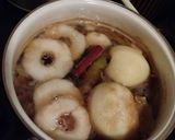 A picture of step 3 of Pastry Puff Poached Pears & Homemade Honey Syrup.