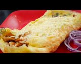 A picture of step 14 of Chicken Cheese Omelette.