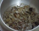 A picture of step 1 of Khada Masala Gosht with chapati.
