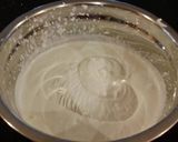 A picture of step 10 of Orange Layer Cake with Orange / Vanilla Whipped Cream Filling and Frosting.