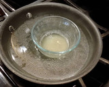 A picture of step 15 of Lemon Layer Cake with Blackberrie Cream Filling and a Lemon Cream Frosting.