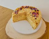 A picture of step 17 of Napoleon cake with crème anglaise and white chocolate cream.