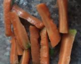 A picture of step 3 of Noodles veggies with Stockfish flakes.