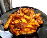 A picture of step 5 of Masala Fries.