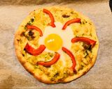 A picture of step 4 of Pizza Bismarck.