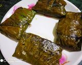 A picture of step 7 of Ilish paturi.