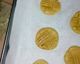 A picture of step 11 of Peanut butter and lemon rinds cookies.