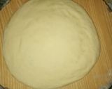 A picture of step 11 of Chicken Malai boti creamy floral pizza in pateela.
