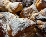 Foto del paso 11 de la receta: Lacitos de hojaldre con crema de chocolate y piñones