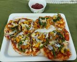 A picture of step 3 of Paneer tikka pizza.
