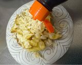 A picture of step 3 of Fried Potatoes with cheese and Japanese sauce.