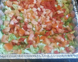 A picture of step 6 of Brad's seven layer dip to feed an army.