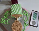 A picture of step 18 of Quaid e Azam police Medal QPM coffee cake.