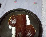 Foto del paso 7 de la receta Postre navideño. Tronco relleno de crema pastelera y cobertura de chocolate