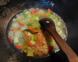 Foto langkah ke 5 dari resep Cumi Isi Tahu Kuah Asam.