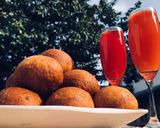 A picture of step 12 of Dry Ghanaian Doughnuts.