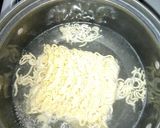 A picture of step 2 of Fried indomie.