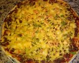 A picture of step 10 of Homemade pizza with minced beef and cheese topping.
