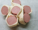 Foto del paso 6 de la receta: Bollo de hojaldre con frankfurt y queso