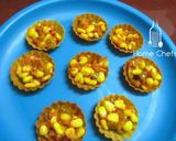 A picture of step 6 of Corn Canapés with Pink frost.