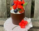 A picture of step 11 of A Pudding for HM Queen, Eton Mess in a handmade Chocolate Cup.