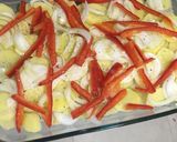 Foto del paso 3 de la receta: Panga al horno con patatas panaderas, pimiento rojo y cebolla