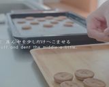 A picture of step 12 of PARISIAN MACARONS (chocolate macarons).