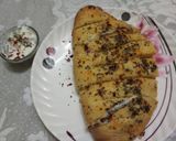 A picture of step 13 of Cheese stuffed garlic bread.