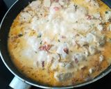 A picture of step 8 of Cheesy Sun-dried Tomato, Basil & Mozzarella Creamy Chicken.