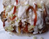 Foto del paso 6 de la receta: Pan🥐 turco relleno con milanesas de berenjena🍆 y calabacín🌮