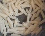 A picture of step 7 of Pesto pasta.
