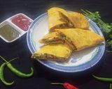 A picture of step 9 of Paneer Stuffed Besan Chilla.
