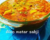 A picture of step 7 of Potato and Fresh greenpeas Curry.