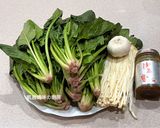 A picture of step 1 of Stir-Fried Spinach and Enoki Mushrooms with Shacha Sauce.