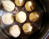 A picture of step 26 of Puran poli modak.