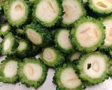 A picture of step 1 of Crispy Karela (bitter gourd).