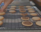 A picture of step 10 of Langue-de-chat Cookies (chocolate sandwich).