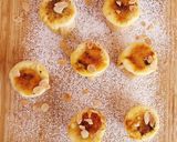 A picture of step 19 of Mini Hazelnut and Walnut Praline Piononos with Pastry Cream.