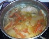 Hình bước làm 3 của món Canh măng chua nấu đầu cá hồi