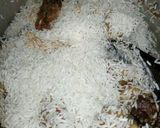 A picture of step 6 of Goat pilau with potatoes and coconut.