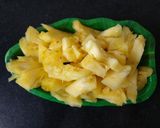 A picture of step 2 of Pina colada fruit salad.